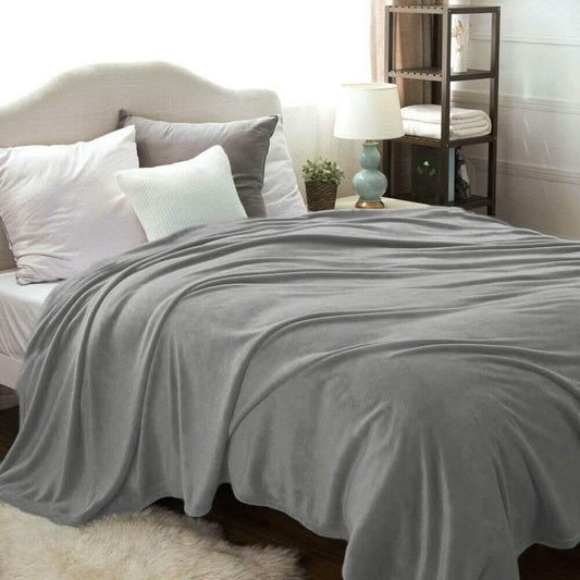 Kathy Ireland Flannel Solid Microplush Bed Blankets
